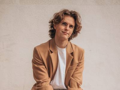 Russian cosmonauts work on robotic arm outside space